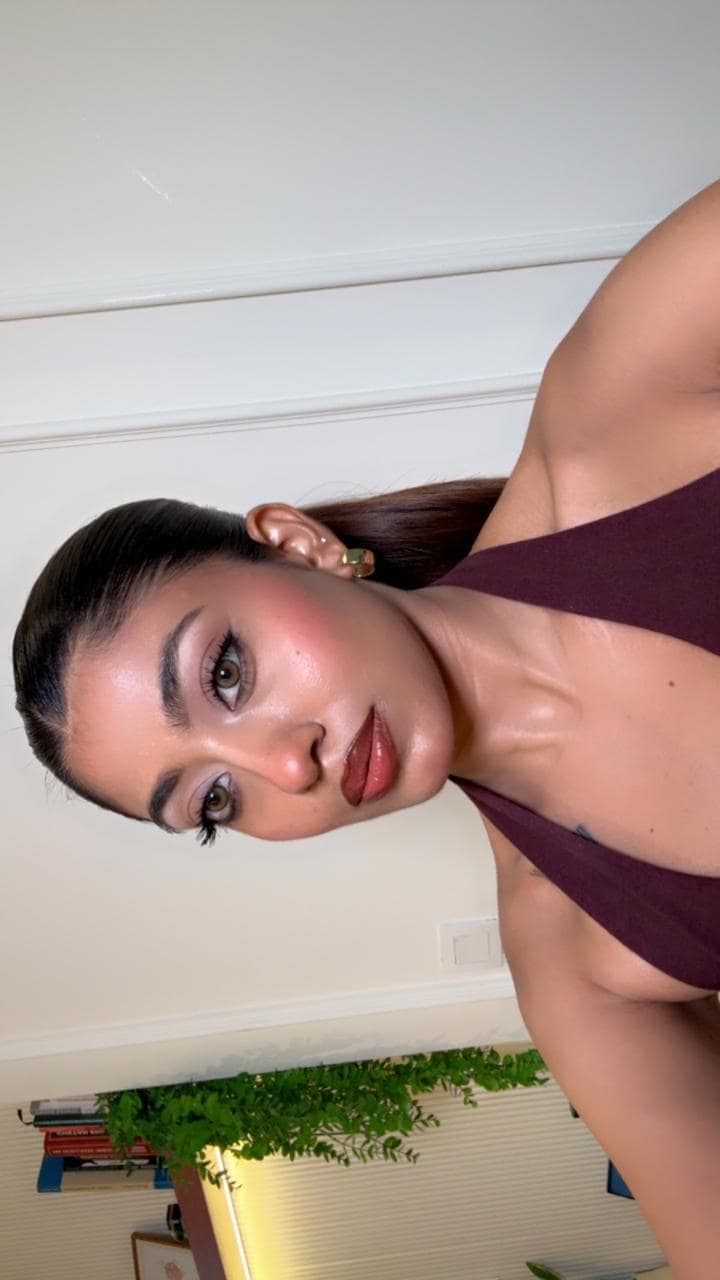 Soft glam makeup with glowing skin, brushed-up brows and a neutral satin lip